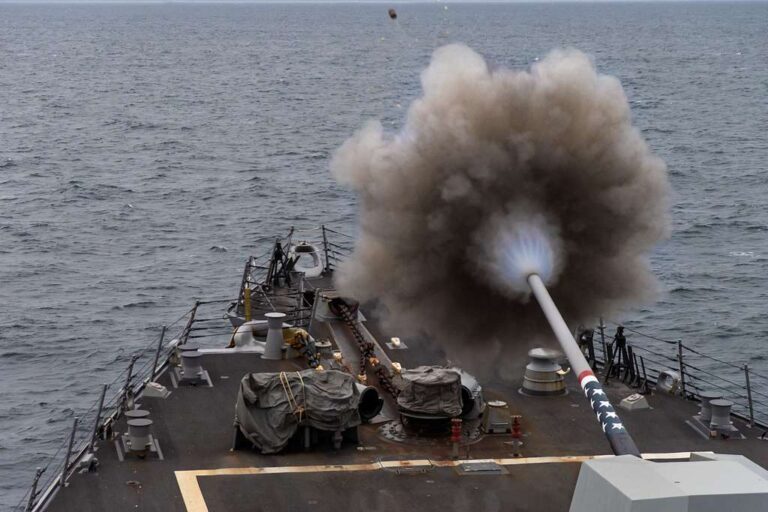 The guided-missile destroyer USS Gravely (DDG 107) fires its 5-inch gun during a live-fire exercise as part of Joint Warrior 19-1